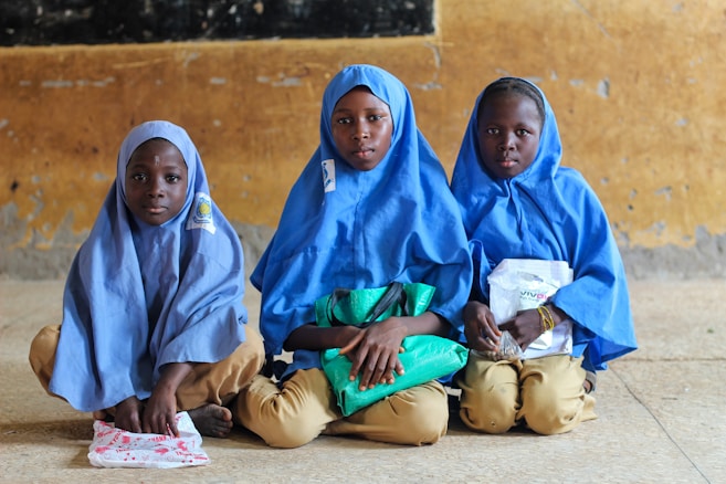 Children in blue hijabs